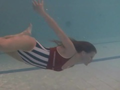 Find-Best-Panties.com presents: Leggy girl swims and strips naked in pool