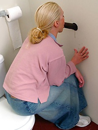 Find-Best-Panties.com presents: Blonde girl Jamie sits on the toilet and blows a black gloryhole dong